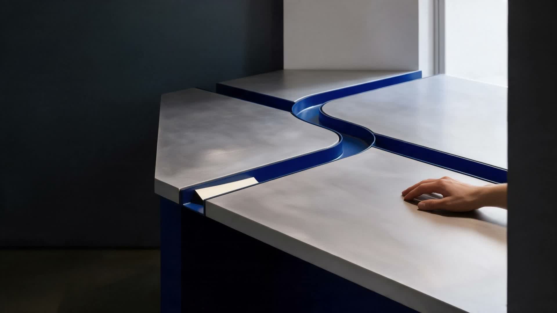 An ivory sheet at a review table within reach of a person's hand — an illustration of human oversight